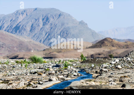 Traditional falaj irrigation system in the mountain village of Misfat ...