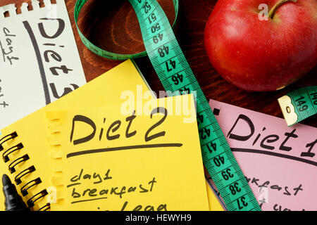 Papers with title diet and different meal plans. Stock Photo
