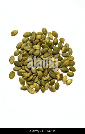 Unshelled pumpkin seeds isolated on white background Stock Photo