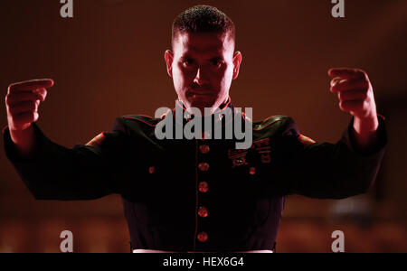 NEW YORK -- Staff Sgt. William Kilian, a Syracuse, N.Y., native walks students of Francis Lewis High School, Queens, N.Y., and members of the Albany Marine Band through a warm up routine, Oct. 19. The Marines are in town playing for local high schools and giving clinics to the band students there.  (Official Marine Corps photo by Sgt. Randall A. Clinton / RELEASED) Flickr - DVIDSHUB - Albany Ga., Marine Corps Band plays NY High School, Oct 19 Stock Photo