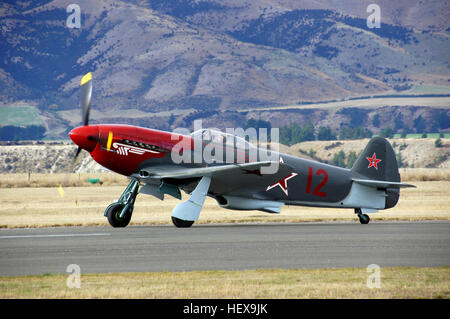The Yakovlev Yak-3  was a World War II Soviet fighter aircraft. Robust and easy to maintain, it was much liked by pilots and ground crew alike. It was one of the smallest and lightest major combat fighters fielded by any combatant during the war, and its high power-to-weight ratio gave it excellent performance. It proved a formidable dogfighter. Marcel Albert, the official top-scoring World War II French ace, who flew the Yak in USSR with the Normandie-Niémen Group, considered it a superior aircraft to the P-51D Mustang and the Supermarine Spitfire. ] After the war ended, it flew with the Yugo Stock Photo