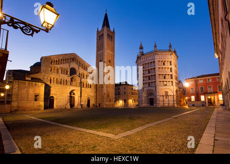 Early morning twilight over the Duomo and Baptistery in Piazza del Duomo, Parma, Emilia-Romagna, Italy Stock Photo