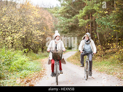 Senior couple doing a bicycle trip Stock Photo