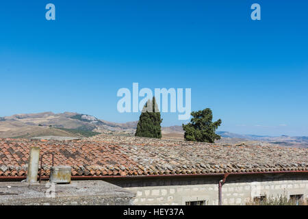 Ancient Sicilian rural architecture. Roofs with old clay tiles. All uninhabited houses. Old buildings. The places of Montalbano, TV dramas. A novel by Stock Photo