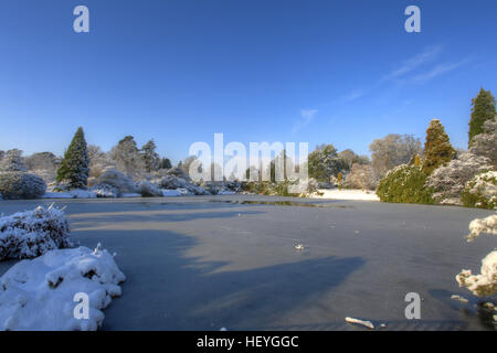 Snow covered Sheffield Park Gardens, East Sussex, England, UK Stock Photo