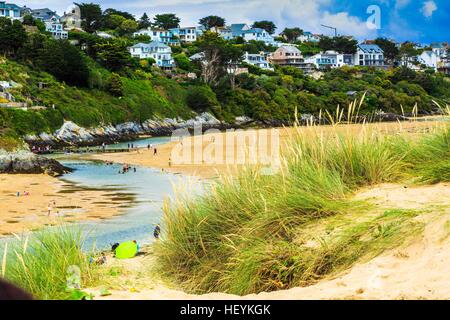 A views across the sand dunes at Crantock Beach and the Gannel River estuary in Newquay, Cornwall, UK Stock Photo