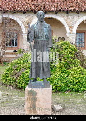 Father Junipero Serra statue in front of Mission San Antonio Stock Photo