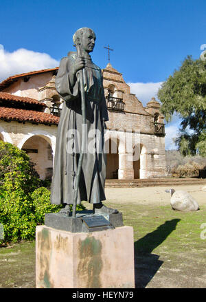 Father Junipero Serra statue in front of Mission San Antonio Stock Photo