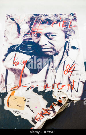 torn poster showing french composer and singer serge gainsbourg Stock Photo