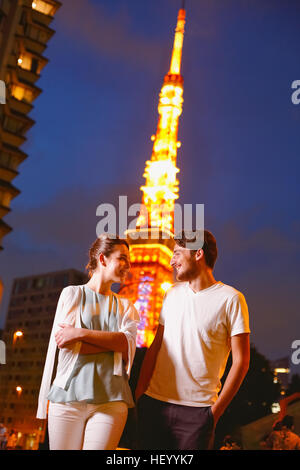 Caucasian couple enjoying sightseeing in Tokyo, Japan Stock Photo
