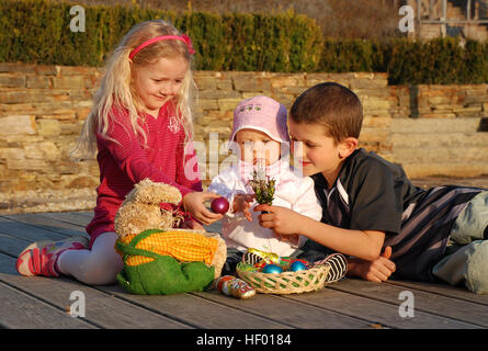 Children and an Easter nest Stock Photo