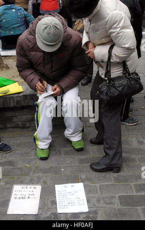 Beijing, China. 13th Nov, 2016. Visitors at the marriage market in the park by the Temple of Heaven in Beijing, China, 13 November 2016. Photo: Amelie Richter/dpa/Alamy Live News Stock Photo