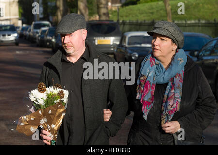 London, UK. 26th December, 2016.A fan with flowers in memory of George Michael outside his London home, The Grove, Highgate, North London. The pop superstar has died at the age of 53 from suspected heart failure. Credit: Alex MacNaughton/Alamy Live News Stock Photo
