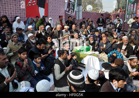 Leaders and supporters of Peoples Party (PPP) offer Dua for soul of PPP Chairperson Benazir Bhutto during ceremony on the occasion of her death anniversary held in Rawalpindi on Tuesday, December 27, 2016. Stock Photo