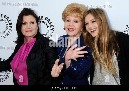 FILE PIC: Beverly Hills, CA, USA. 7th June, 2011. 27 December 2016 - Carrie Fisher, the iconic actress who portrayed Princess Leia in the Star Wars series, died Tuesday following a massive heart attack. Carrie Frances Fisher an American actress, screenwriter, author, producer, and speaker, was the daughter of singer Eddie Fisher and actress Debbie Reynolds. File Photo: 7 June 2011 - Beverly Hills, California - Carrie Fisher, Debbie Reynolds and Billie Lourd. Credit: ZUMA Press, Inc./Alamy Live News Stock Photo