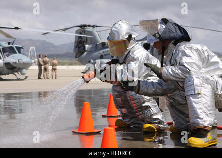 Aircraft Rescue and Firefighting personnel demonstrate equipment and ...