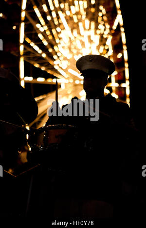 Sgt. Joshua Scott, an assistant transportation clerk with the Marine Corps Band New Orleans, performs at Navy Pier here, Aug. 15. The performance was part of a three-year national celebration honoring the War of 1812 and 'The Star-Spangled Banner.' The festivities began in New Orleans in April 2012 with other celebrations taking place in Chicago, New York, Baltimore, Boston, Cleveland and other cities. The Marine Corps Band New Orleans undertook a seven-week trip to Northern United States to perform during these events. The Marine Corps' role in this event reinforces its naval character and sh Stock Photo