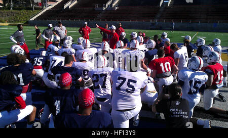 Players on the Semper Fidelis All-American Bowl West team listen to their coaches during practice at Santa Ana Stadium in Santa Ana, Calif., today. One hundred of the top high school football players in the country are in the Los Angeles area for the second Semper Fidelis All-American Bowl, which will be aired live on NFL Network at 6 p.m. PST, Jan. 4, 2013.  (US Marine Corps photo by Staff Sgt. Clinton Firstbrook) Semper Fidelis All-American Bowl 131231-M-xx999-657 Stock Photo