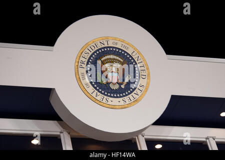 President Barack Obama watches the inauguration parade from the official review stand on Monday, Jan. 21, 2013. Above the president's reviewing booth is the seal of the president of the United States. It is used to mark correspondence from the president to the United States Congress and as a symbol of the presidency. During the 10-day inaugural period, approximately 6,000 National Guard personnel from more than 30 states and territories worked for Joint Task Force-District of Columbia, providing traffic control, crowd management, transportation, communication, medical and logistical support as Stock Photo