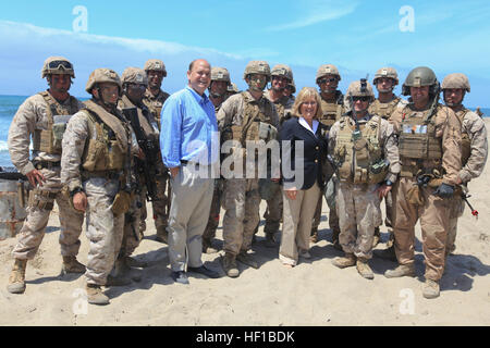 Rep. Diane Black of Tenn. and Congressman Tom Reed from N.Y. stand with U.S. Marines during Dawn Blitz 2013 at Green Beach on Camp Pendleton, Calif., June 23, 2013. The Marines had just completed a beach landing training exercise for Dawn Blitz 2013, a multinational amphibious exercise that promotes interoperability between the Navy and Marine Corps and coalition partners, June 11-28. Participating countries include Canada, Japan, New Zealand and observers from seven countries. (U.S. Marine Corps photo by Lance Cpl. Darien J. Bjorndal/Released) U.S. Marines Conduct Beach Landing 130623-M-MF313 Stock Photo
