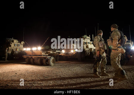 Georgian Army soldiers assigned to the 33rd Light Infantry Battalion stage their vehicles before conducting Operation Northern Lion on Camp Leatherneck, Helmand province, Afghanistan, June 24, 2013. Northern Lion was a Georgian-led operation conducted to deter insurgents, establish a security presence, and gather human intelligence in the area. (U.S. Marine Corps photo by Cpl. Alejandro Pena/Released) Coalition Forces prepare for Operation Northern Lion 07 Stock Photo