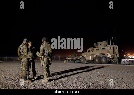 Georgian Army soldiers assigned to the 33rd Light Infantry Battalion stage their vehicles before conducting Operation Northern Lion on Camp Leatherneck, Helmand province, Afghanistan, June 24, 2013. Northern Lion was a Georgian-led operation conducted to deter insurgents, establish a security presence, and gather human intelligence in the area. (U.S. Marine Corps photo by Cpl. Alejandro Pena/Released) Coalition Forces prepare for Operation Northern Lion 12 Stock Photo