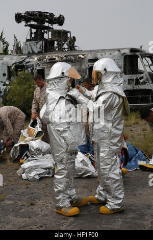 Aircraft rescue firefighter’s suit up in full proximity gear during ...