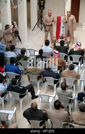 071206-M-2819S-015 AL FALLUJAH, Iraq (Dec. 6, 2007) Regimental Combat Team 6, commanding officer, U.S. Marine Corps Col. Richard L. Simcock, delivers remarks on the opening of a new Iraqi police station during a ribbon cutting ceremony. U.S. Marine Corps photo by Sgt. Neill A. Sevelius (Released) US Navy 071206-M-2819S-015 Regimental Combat Team 6, commanding officer, U.S. Marine Corps Col. Richard L. Simcock, delivers remarks on the opening of a new Iraqi police station during a ribbon cutting ceremony Stock Photo