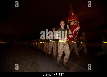 U.S. Marines and sailors assigned to the 26th Marine Expeditionary Unit (MEU) conduct a noncommissioned officer and staff noncommissioned officer run aboard U.S. Naval Station Rota, Spain, Oct. 22, 2013. The 26th MEU is a Marine Air-Ground Task Force forward-deployed to the U.S. 6th Fleet area of responsibility aboard the Kearsarge Amphibious Ready Group serving as a sea-based, expeditionary crisis response force capable of conducting amphibious operations across the full range of military operations. (U.S. Marine Corps photo by Sgt. Christopher Q. Stone, 26th MEU Combat Camera/Released) 26th  Stock Photo