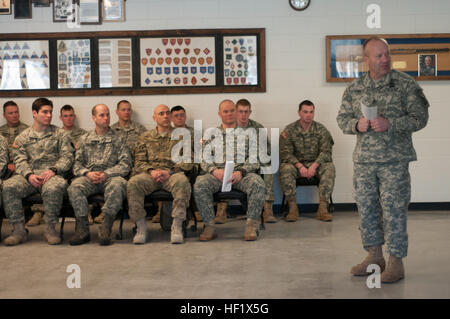 U.S. Army Command Sgt Maj. Brunk W. Conley, Command Sgt. Maj. for the Army National Guard, addresses soldiers during a graduation ceremony at the Army Mountain Warfare School, Ethan Allen Firing Range, Jericho, Vt., Jan. 24, 2014. Graduates were comprised of Soldiers attending either the Basic or Advanced Military Mountaineering Winter courses. (U.S. Air National Guard photo by Staff Sgt. Sarah Mattison) Army National Guard Command Sgt. Maj. Brunk Conley visits Army Mountain Warfare School 140124-Z-KE462-074 Stock Photo
