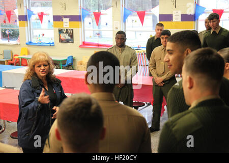 Marines and Sailors from MCAS Cherry Point participate in National School Breakfast Week at Chicod School in Greenville, North Carolina, engaging with students to promote community relations and support educational programs. Stock Photo