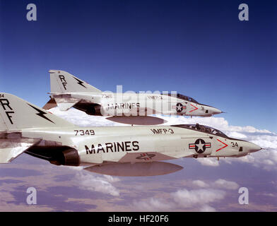 A right rear view of two RF-4C Phantom II aircraft of Marine Photo Reconnaissance Squadron Three (VMFP-3) over the Marine Corps Air Station during a training mission. VMFP-3 aircraft in flight Stock Photo