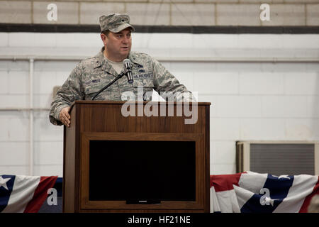 Brig. Gen. Gary W. Keefe, Massachusetts Air National Guard Commander, speaks to members of the 212th Engineering Installation Squadron and their families at Otis Air National Guard Base, Mass. on March 21, 2014. Members of the 212th will be deploying in support of Operation Enduring Freedom from late March to late November. (National Guard photo by Staff Sgt Jeremy Bowcock/Released) 102nd Intelligence Wing holds send off ceremony for 31 membersE28099 upcoming deployment 140321-Z-FW757-089 Stock Photo