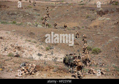 French soldiers with the 5th Combined Arms Regiment Overseas and U.S. Marines with Battalion Landing Team 1st Battalion, 6th Marine Regiment, 22nd Marine Expeditionary Unit (MEU), conduct a patrol as part of a U.S.-French bilateral exercise. The exercise is designed to improve interoperability between nations, increase readiness and develop professional relationships. The 22nd MEU is deployed with the Bataan Amphibious Ready Group as a theater reserve and crisis response force throughout U.S. Central Command and the U.S. 5th Fleet area of responsibility. (U.S. Marine Corps photo by Gunnery Sgt Stock Photo