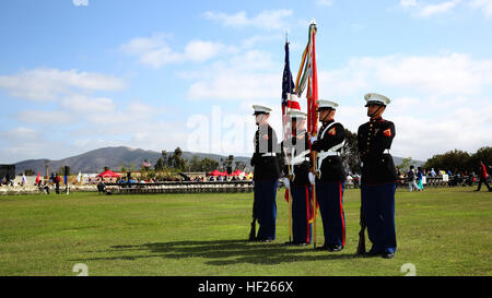 Corporal Justin G. Rush, right center, embarkation specialist, 15th Marine Expeditionary Unit, practices with the color guard before presenting the Colors during a commencement ceremony at Palomar College campus in San Marcos, Calif., May 20, 2014. Rush, 20, is from Tacoma, Wash. (U.S. Marine Corps photo by Cpl. Emmanuel Ramos/Released) Warrior Wednesday, Marine from Tacoma, Wash. 140519-M-ST621-039 Stock Photo