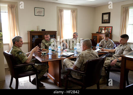 The Commandant General of the British Royal Marines, Maj. Gen. Martin Smith, left, attends a meeting with U.S. and British Marines at Marine Corps Base Quantico, Va., July 22, 2014. Smith is on his first trip to the states since assuming the role of commandant. (U.S. Marine Corps photo by Staff Sgt. Brian Lautenslager, HQMC Combat Camera/Released) British Royal Marines Visit MCB Quantico, Va 140722-M-OH106-097 Stock Photo
