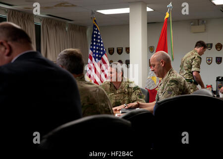 The Commandant General of the British Royal Marines, Maj. Gen. Martin Smith, center, attends a meeting with U.S. and British Marines at Marine Corps Base Quantico, Va., July 22, 2014. Smith is on his first trip to the states since assuming the role of commandant. (U.S. Marine Corps photo by Staff Sgt. Brian Lautenslager, HQMC Combat Camera/Released) British Royal Marines Visit MCB Quantico, Va 140722-M-OH106-087 Stock Photo
