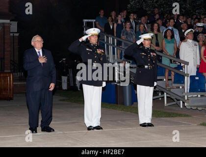 From left, the Evening Parade guest of honor, Michigan Sen. Carl M. Levin; the parade host, Assistant Commandant of the Marine Corps, Gen. John M. Paxton, Jr.; and the Commanding Officer of Marine Barracks Washington (MBW), Col. Benjamin Watson, stand for honors during the parade at MBW in Washington, D.C., July 25, 2014. The Evening Parades are held every Friday night during the summer months. (U.S. Marines Corps photo by Cpl. Tia Dufour/Released) Evening Parade 140725-M-KS211-063 Stock Photo