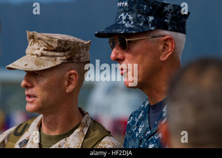 Adm. Samuel J. Locklear III, commander of U.S. Pacific Command and Sgt. Maj. William T. Stables, U.S. Marine Corps Forces, Pacific, discuss the sequence of events before the U.S. Marine Corps Forces, Pacific change of command ceremony on Marine Corps Base Hawaii, August 15, 2014. Lt. Gen. John A. Toolan Jr. assumed command from Lt. Gen. Terry G. Robling during the ceremony. (U.S. Marine Corps photo by Lance Cpl. Wesley Timm/Released) MARFORPAC Change of Command Ceremony 140815-M-AR450-011 Stock Photo