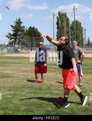 A Marine practices discus during field training in preparation for the ...