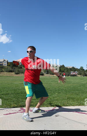 A Marine practices discus during field training in preparation for the ...