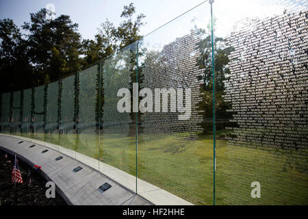 At the intersection of Lejeune Boulevard and Montford Landing Road in Jacksonville, is a place where the people in Jacksonville and Marine Corps Base Camp Lejeune come together to remember and reflect on events that affected the community at large. At Lejeune Memorial Gardens, visitors can view monuments memorializing the Vietnam War, the 1983 bombings of the barracks in Beirut and the attacks on the World Trade Center on Sept. 11, 2001. Lejeune Memorial Gardens, A place to reflect 141002-M-IY869-161 Stock Photo