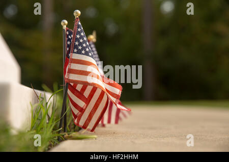 At the intersection of Lejeune Boulevard and Montford Landing Road in Jacksonville, is a place where the people in Jacksonville and Marine Corps Base Camp Lejeune come together to remember and reflect on events that affected the community at large. At Lejeune Memorial Gardens, visitors can view monuments memorializing the Vietnam War, the 1983 bombings of the barracks in Beirut and the attacks on the World Trade Center on Sept. 11, 2001. Lejeune Memorial Gardens, A place to reflect 141002-M-IY869-190 Stock Photo