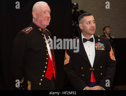 U.S. Marine Lt. Gen. Richard P. Mills, Commander of Marine Forces Reserve (MARFORRES) and Marine Forces North (MARFORNORTH), and U.S. Marine Sgt. Maj. Anthony A. Spadaro, Sergeant Major of MARFORRES and MARFORNORTH, observe the Marine Corps Band New Orleans practicing before the celebration of the 239th U.S. Marine Corps Birthday Ball held at the Riverside Hilton Hotel, New Orleans, La., Nov. 1, 2014. This year marks the 239th Marine Corps Birthday Ball Celebration honoring those past, present and future Marines throughout history. (U.S. Marine Corps photo by Lance Cpl. Mackenzie Schlueter/Rel Stock Photo