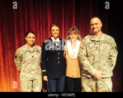 Second Lt. Keerstin Beitter, with 1-207th Aviation, Alaska Army National Guard, stands alongside her mother, Kristina Murakami, and Alaska Army National Guard recruiters Capt. Terri Lopez and Maj. David Jurva at her Officer Candidate School graduation ceremony in Fort Benning, Ga., Nov. 6. Beitter is the first Soldier to use the federal program as a commissioning source for non-prior-service enlistees. (Photo courtesy 2nd Lt. Keerstin Beitter) The fast track to a commission for Guard members 141106-Z-KB001-001 Stock Photo