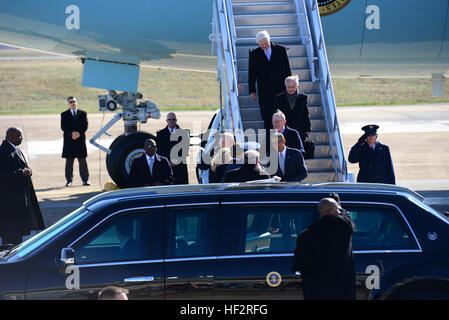 President Barack Obama, accompanied by Sens. Lamar Alexander and Bob Corker, and Congressman Jim Duncan, are greeted by Vice President Joe Biden, Tennessee Gov. Bill Haslam, Knoxville Mayor Madeline Rogero and 134th Air Refueling Wing Commander Thomas Cauthen as they exit Air Force One at McGhee Tyson Air National Guard Base, Tenn., Jan. 9. The president visited Pellissippi State Community College in Knoxville to announce a new education initiative. (U.S. Air National Guard photo by Master Sgt. Kendra M. Owenby, 134 ARW Public Affairs) 134 ARW 150109-Z-KE851-294 Stock Photo