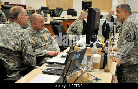 Commander and staff officers of 66th Troop Command, Mississippi Army National Guard, acting as high command, discuss events of exercise Allied Spirit I Jan. 21, 2015, at the Joint Multinational Readiness Center in Hohenfels, Germany. The event includes more than 2,000 participants from Canada, Hungary, the Netherlands, the United Kingdom and the United States and exercises interoperability with NATO allies. Mississippi National Guard assist in NATO exercise 150121-Z-MX357-030 Stock Photo