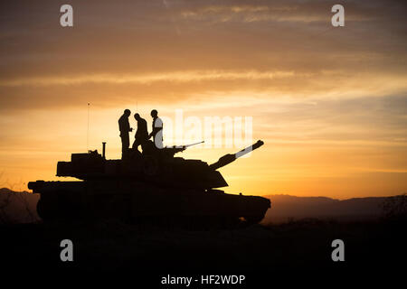 U.S. Marines assigned to Delta Company, 1st Tanks Battalion, 1st Marine Division, wake up the morning of the Tank Mechanized Assault Course during Integrated Training Exercise (ITX) 2-15 at the Delta Prospect Training Area aboard Camp Wilson, Marine Corps Air Ground Combat Center Twentynine Palms, Calif., Feb. 1, 2015. ITX 2-15, being executed by Special Purpose Marine Air-Ground Task Force 4 (SPMAGTF-4), is being conducted to enhance the integration and warfighting capability from all elements of the MAGTF. (U.S. Marine Corps photo by Lance Cpl. Aaron S. Patterson, MCBH Combat Camera/Released Stock Photo