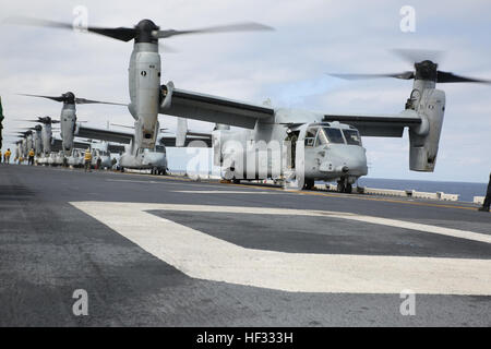 Eight U.S. Marine Corps MV-22B Ospreys line up and prepare to take off from the flight deck of the USS Bonhomme Richard (LHD 6), at sea, March 13, 2015. The Ospreys are transporting U.S. Marines for an airfield seizure training operation. The Ospreys are with Marine Medium Tiltrotor Squadron 262 (Reinforced), 31st Marine Expeditionary Unit (MEU). The Marines of the 31st MEU are currently on their annually-scheduled Spring Patrol of the Asia-Pacific region. (U.S. Marine Corps photo by Lance Cpl. Ryan Mains/released) Eight Ospreys take off from USS Bonhomme Richard 150313-M-WM612-047