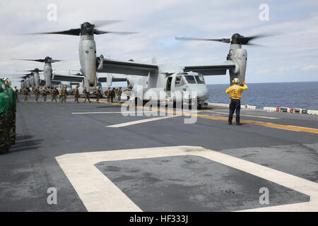 U.S. Marines walk into an MV-22B Osprey on the flight deck of the USS Bonhomme Richard (LHD 6), at sea, March 13, 2015 The Ospreys are transporting U.S. Marines for an airfield seizure training operation. The Ospreys are with Marine Medium Tiltrotor Squadron 262 (Reinforced), 31st Marine Expeditionary Unit (MEU), and the Marines are with Company E, Battalion Landing Team 2nd Battalion, 4th Marines, 31st MEU. The Marines of the 31st MEU are currently on their annually-scheduled Spring Patrol of the Asia-Pacific region. (U.S. Marine Corps photo by Lance Cpl. Ryan Mains/released) Eight Ospreys ta